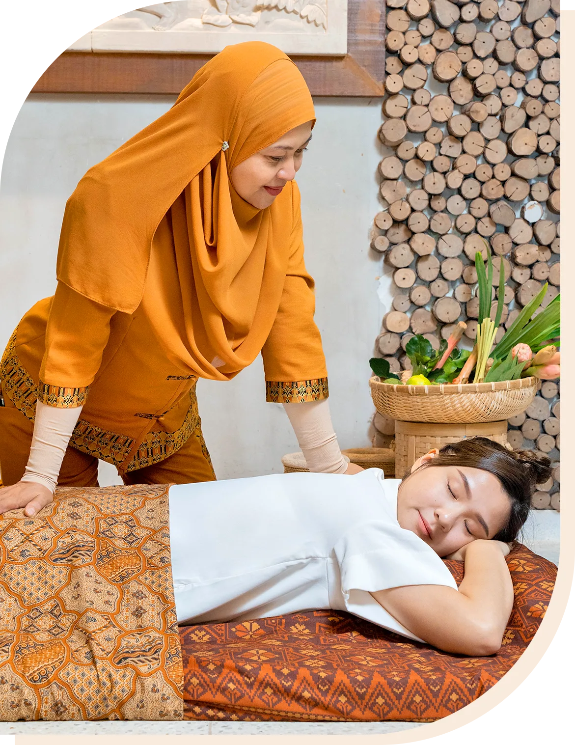 iBidan practitioner performing authentic Malay postnatal massage